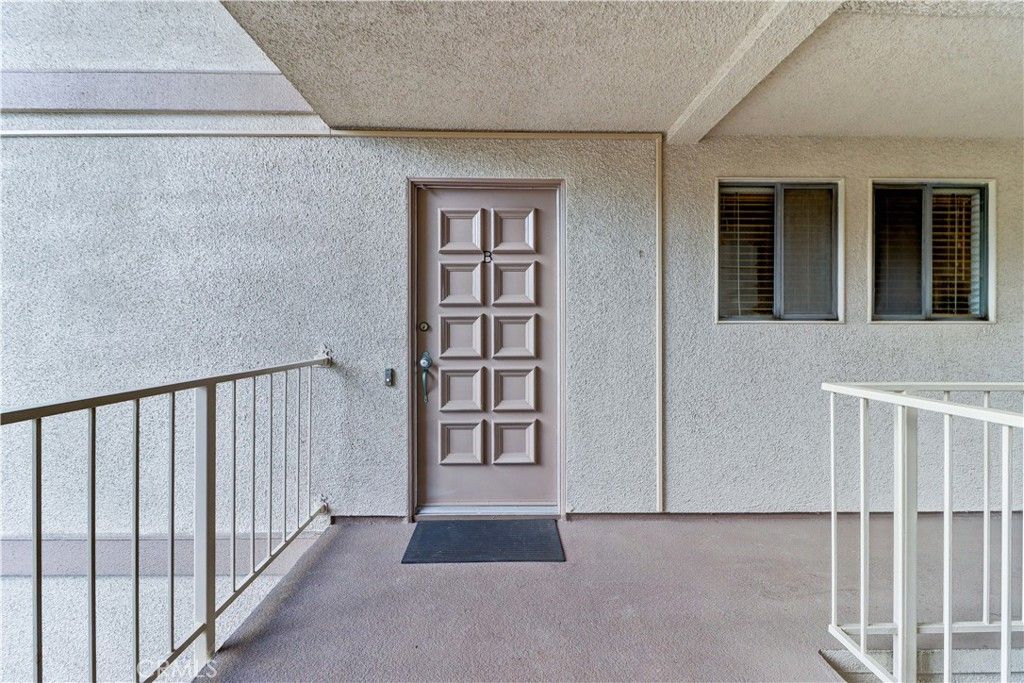 Photo of 661 Avenida Sevilla #B, Laguna Woods, CA 92637 (MLS # OC26070123)