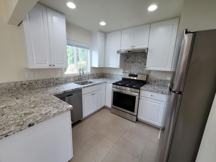 Come see this rare updated ground floor unit located in a quiet neighborhood with a large private backyard. This updated unit boasts a modern bathroom with a frameless shower enclosure and an updated kitchen with quartz countertops and stainless steel appliances. The unit also boasts porcelain tile flooring throughout, hardwood flooring in the bedrooms, Energy Efficient Recess Lighting throughout with dimmable switches, a minisplit A/C unit for the upcoming summer, and fresh paint. This unit is located in one of the best school districts in Cupertino Area: Garden Gate Elementary, Lawson Middle, and Monta Vista High. One reserved covered parking spot with a 220V EV Charging outlet. Wifi internet, water, garbage, and sewer are included in the rent. The unit is conveniently located within walking distance to Apple Campus, Marina, Target, Wholefoods, and located near many major highways including 280, 85, and 101.