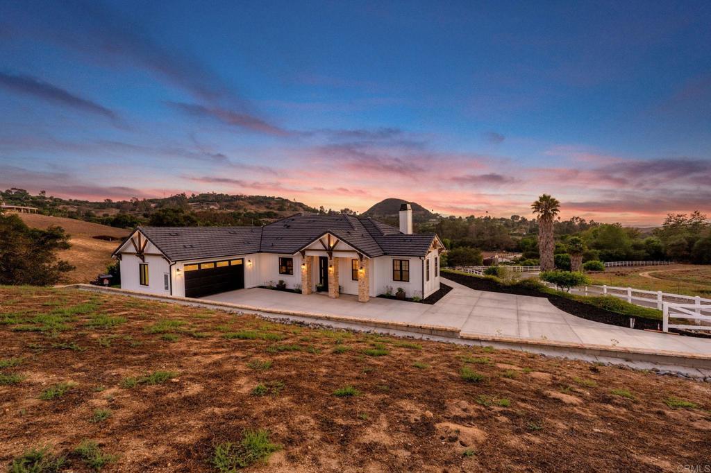 Brand new custom one level home located in the coveted Morro Hills area of Fallbrook. Volume ceilings with crown molding, cantina disappearing doors to covered brick laced patio, high end brushed bronze fixtures, quartzite counters and many designer touches. Top quality built in custom cabinetry throughout the home. Fully fenced parcel and room for RV or boat parking. Zoned for horses, chickens and any 4-h projects you may want. Enjoy the dramatic sunset vistas setting over the treetops and the cooling ocean breeze from your large covered patio adjoining the great room and primary bedroom suite. With uncompromising quality you will notice upon entering this special home, you will not want to miss this opportunity. Plan your private tour today!
