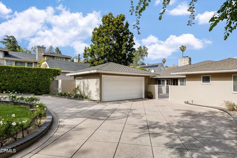 Photo of 1660 S Oak Knoll Avenue, San Marino, CA 91108 (MLS # P1-27491)