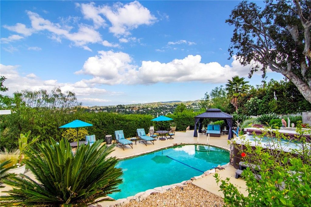 Photo of 5038 Cerrillos Drive, Woodland Hills, CA 91364 (MLS # SR26073178)