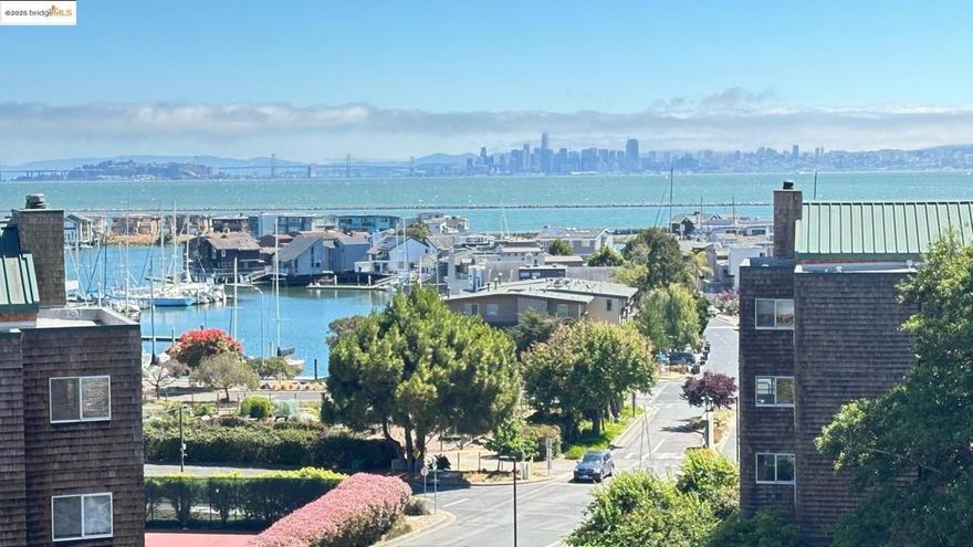 One of only a few units with THREE different outside decks in Brickyard Landing. Enjoy southwest exposure from deck #1 with gorgeous bayview and views of SF, Treasure Island, Bay Bridg. Deck #2 facing east, offering a perfect spot for morning sunrises and watching deers walking around. Deck #3 faces northest and offers a spcious area, perfect for entertaining, lunch and twilight dinner. French doors that graciously open to bold, glass-enclosed solarium with terra cotta tiled flooring. Distinctive gourmet kitchen that expand into cozy breakfast nooks. Wood-burning fireplace with tiled surrounds. New paint throughout. Being the end unit, it offers privacy with only one common wall. Only first level units are able to use same flooring throughout the entire unit. Such as wood or tile flooring in every room. Easy access to outside through the side door that steps away from the unit. Owner has been living in the same unit for 30 year. They updated the kitchen counter top as corian. Total five room including the solarium. Weelchair accessable. Side by side 2 parkings with storages where is one level down. Receation facilities including competition-quality tennis court, exclusive swimming pool and spa complex, a parcourse, saunna and fully equipped exercise. 30-minutes ferry ride to SF.