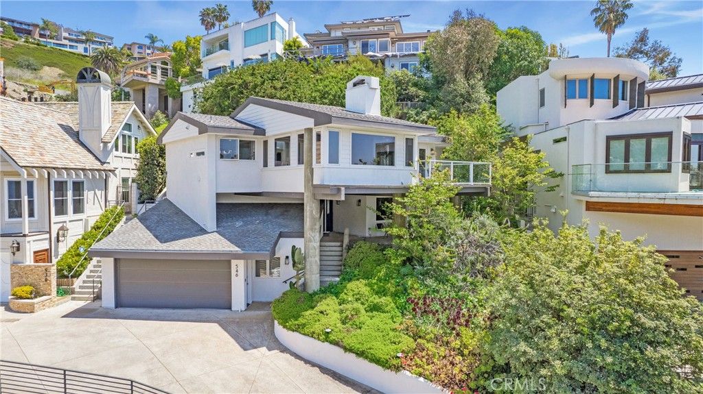 Photo of 546 Temple Hills Dr, Laguna Beach, CA 92651 (MLS # OC26066391)
