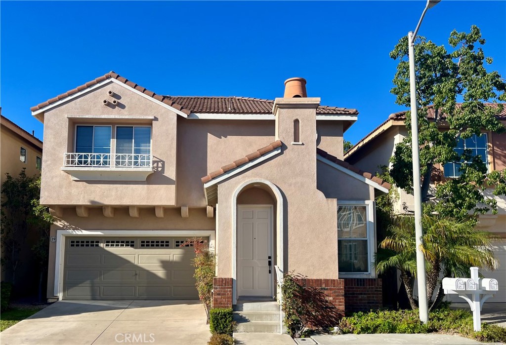 Live in style in this beautiful 3-bedroom, 2.5-bathroom home located in the desirable Tiburon neighborhood of Aliso Viejo. This home offers the perfect blend of style and comfort. Step inside to a bright, open living space with beautiful hardwood floors and a cozy fireplace, perfect for unwinding after a long day. The large kitchen features elegant granite counters and a spacious island, making it a great space for both daily meals and entertaining. The entire area is filled with natural light, thanks to an abundance of windows and plantation shutters. All three bedrooms are located upstairs, including a spacious main suite with a walk-in closet. The convenient upstairs laundry room makes chores a breeze. The two-car garage, along with a driveway, provides the convenience of additional parking. The backyard is currently undergoing a renovation and promises to become a private sanctuary for outdoor relaxation and entertaining. This home is perfectly positioned in the center of it all. The house is minutes away from the vibrant dining and entertainment scene at Aliso Viejo Town Center, Soka University, and Laguna Niguel Regional Park. With easy access to the toll road and freeways, driving from some of Southern California's best beaches is within 20 mins. Enjoy the added convenience of being within walking distance to award-winning schools, scenic parks, and beautiful nature trails right from your doorstep.