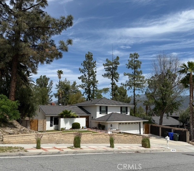 This home is available in the Sunset Hills community that features 4 bedrooms, 3 bath plus a room for a Den/office (5 rooms totaled) with 3 levels to the home. The top level has Master bedroom, 2 closets, tiled shower & vanity. 2 bedrooms across and additional bathroom. 2nd level is the entry level to kitchen, dining area & living room. Downstairs is the 3rd level to garage, 1 bedroom with fireplace & a room that can be used for a office/Den/family room. There is inside full-size laundry hookups and bathroom with walk-in shower. There is a large size pool with a lot size of 14,597 with tons of space left to your imagination. As you walk into the front double doors you will enter the spacious living room with large size windows and slider to the back yard. The flooring downstairs is travertine with recess lighting through the home. The kitchen has lots of cabinets with darker cherry wood, stainless steel appliances. Atrium has windows around 3 sides with huge waterfall. Seller has done some nice upgrades to the home but there is some TLC that needs to be done.
This home is close to fwy for those who commute, shopping, elementary school and newer sand canyon plaza shopping center that recently opened up.