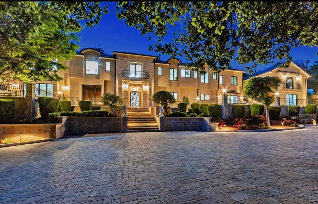 Villa di Fiori - Step into the world of refined elegance in this Award-Winning Architectural Masterpiece, offering unparalleled Luxury & Seclusion in the coveted Los Gatos vistas of Silicon Valley. Extraordinary multi-generational Smart home, remodeled in 2025 spans 12,405 combined Sq Ft of ultra-private meticulously designed living space on 3.56+ acres, features a Tesla roof, Infinity-edge pool & Jacuzzi, California doors, Invigorating 360 degree Panoramic & Sunset Views - 8 suites, 10.5 baths, Executive Office, Theater, Game Room, Music Room, Loft, 4 fireplaces, Fire pit, 2 Balconies, 3 Staircases, Gym, 2 Bars, Wine Cellar & so much more. Finishes imported from around the globe. High definition surround sound & artistry were a top priority in setting the ambiance for this former San Jose Symphony Showcase Mansion effortlessly accommodating 125+ guests. Experience the cascading waterfall and scent of fresh flowers, inviting you to relax & rejuvenate in the Lap of Luxury. Italian-inspired architectural landmarks, Verandas & Fountains accented by Roses, Italian Cypress, an Olive Grove & pristine Sculpture Gardens. Smart lighting, Surveillance, 3-car garage+++++ Minutes from DT Los Gatos, making it ideal for running, biking, shopping designer boutiques & fine dining. Welcome home.