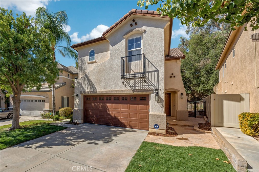 Welcome to this beautiful two-story detached condo just like a single family home featuring 4 bedrooms and 2.5 bathrooms. Bright and airy with abundant natural sunlight, this residence offers laminate wood flooring throughout both levels. The inviting floor plan opens to a spacious living and dining area, seamlessly connected to the updated kitchen with soft-close custom cabinetry, quartz countertops, and stainless steel appliances. A generous family room with a cozy fireplace creates the perfect space for gatherings, while the convenient downstairs powder room is ideal for guests. Upstairs, the luxurious primary suite boasts a large walk-in closet and a fully upgraded bathroom complete with custom cabinetry, quartz counters, and a stunning standalone soaking tub. All secondary bedrooms are spacious, light-filled, and comfortable. Enjoy a great-sized backyard, perfect for entertaining, relaxing, or creating your own outdoor retreat. This home combines modern upgrades, thoughtful design, and ample living space—ready for you to move in and enjoy!