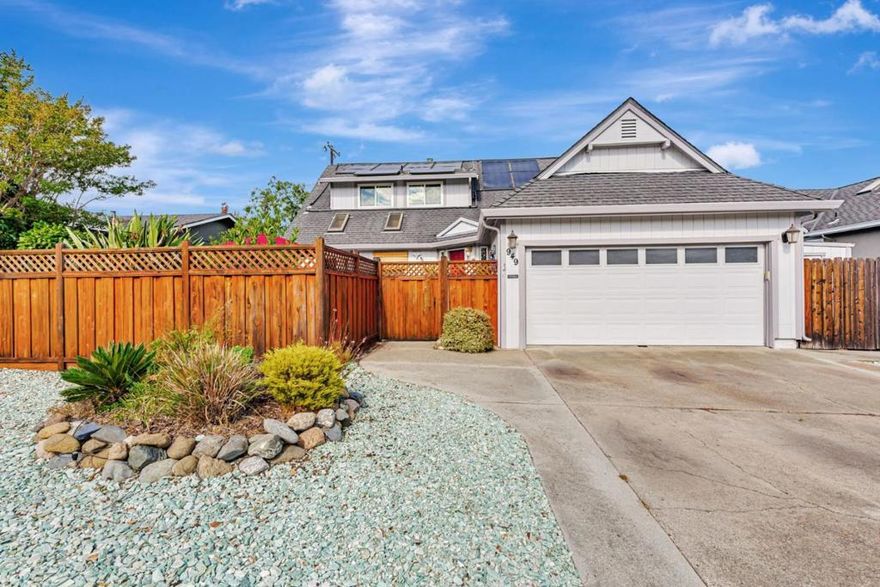 Welcome to this spacious 5/2 home filled with natural light. With over 2,224 sq ft of living space, this property offers both comfort & convenience. The kitchen is a Tuscan-inspired chef's dream, featuring a Viking 6-burner gas cooktop, granite counters, double ovens, island with sink, coffee bar, wine refrigerator and trash compactor, making meals a delight.  The home boasts hardwood, stone, and tile flooring throughout, providing a stylish and low-maintenance environment. The central AC & heat ensure year-round comfort, while the cozy fireplace adds a touch of warmth.  This flexible floor plan allows for a 5th bedroom, formal dining room or den.  The front yard provides a private courtyard for morning coffee in our "weather best by government test" city; while the backyard includes mature fruit trees, a lap pool powered by solar, perfect for both exercise & relaxation. Additionally, a pergola provides a charming outdoor retreat.  Located within the Roy Cloud school district, this home is ideal for families seeking accessibility and functionality. Enjoy all these amenities and more in a prime location convenient to 280 and 101.  Close by Canada College provides a state-of-the-art fitness center available for membership.  This home is ready for its next family to love and enjoy.