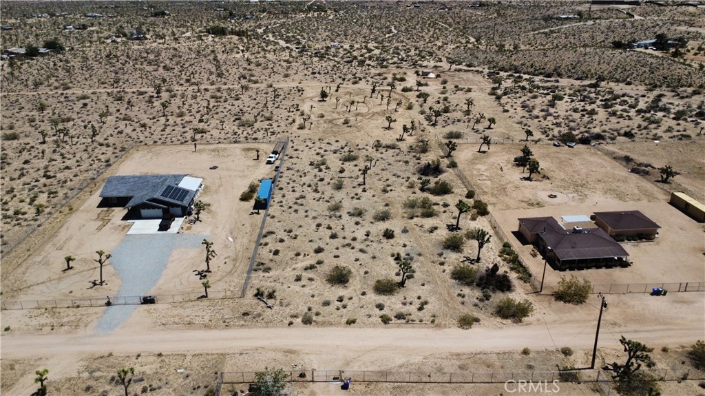 Unbeatable location! Highly desirable Yucca Mesa neighborhood is this 1.25 acre parcel waiting for you to come build your dream home. Whether you're looking to live there long term or build your next investment this property is for you! With neighbors on both sides, the utilities are close but big enough parcel to still give you the rural feel. Just a short distance down a nice dirt road, there is new development happening all around. Great mountain views from this location as well