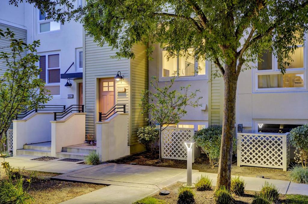 Welcome to this inviting stylish 4BD/4BA home in the coveted Meadow Walk community at Bay Meadows. This bright, modern home offers one of the communitys largest floor plans and is tucked into a private, desirable location near the garden away from street activity. The main level offers a guest bedroom, a spacious living area, dining room & full bath with elegant hardwood floors, recessed lighting w/ design details throughout while the lower level has another bedroom & bath. The updated kitchen has ample cabinetry, stone countertops, stainless steel appliances & center island with bar seating area perfect for entertaining. Private terraces on both the second and third floors provide great outdoor space. Upstairs, has two more bedrooms, including a primary suite w/ a double vanity, a large walk-in closet & an attached terrace. The second en-suite bedroom includes a full bath w/ a shower/tub combo & the laundry closet w/ washer & dryer, is all located on this level. Highlights include an attached 2-car side-by-side garage w/ EV charger, central A/C, tankless water heater & plenty of storage. Enjoy the vibrant Bay Meadows lifestyle with nearby parks, playground, Hillsdale Mall, Caltrain, top dining, shopping & more! Dont miss this opportunity to own a home in Bay Meadows!