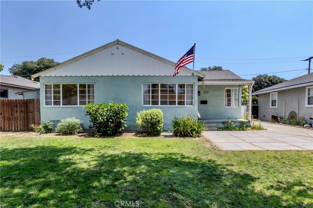 Beautifully remodeled Fullerton Single Story Pool Home with a potential ADU garage conversion. Situated on a quiet cul-de-sac street, this residence welcomes you with an inviting front porch and boasts a wealth of modern upgrades throughout. Step inside to admire gorgeous refinished original wood plank floors and new interior decorator paint. The heart of the home, a remodeled kitchen, shines with newer cabinets featuring convenient pull-outs, new Quartz countertops, and a suite of new stainless steel appliances including a French door refrigerator, 5-burner stove, trash compactor, and dishwasher. The newly remodeled bathroom offers a custom tiled shower. New plumbing, faucets, lighting, and fixtures. For ultimate convenience, an indoor laundry room with included washer and dryer. Central air. A significant highlight is the garage, which is a potential spacious ADU (Accessory Dwelling Unit) featuring a loft and an attached bathroom. While the buyer is responsible for finishing this space to their liking, it presents a remarkable opportunity for rental income, multi-generational living, a detached 3rd bedroom suite or a home office/game room. The spacious 6,540 SF lot is designed for outdoor enjoyment, featuring a private pool, a long driveway, a lush grass area, and a BBQ patio – perfect for entertaining or relaxing. Enjoy the benefits of a prime Fullerton location with no HOA fees and a low property tax rate. The district website shows this home attends Sunny Hills High School. Conveniently located near the Muckenthaler Cultural Center, as well as being close to shopping, parks, and restaurants.