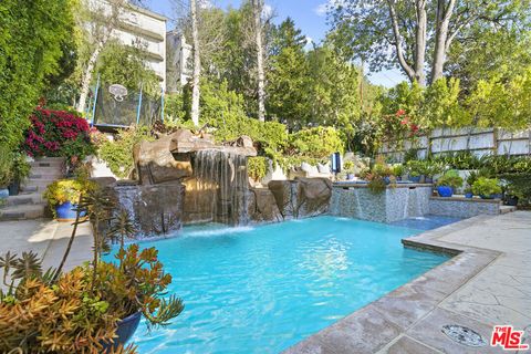 Photo of 5176 Don Pio Drive, Woodland Hills, CA 91364 (MLS # 26860105)