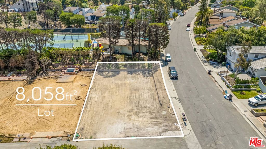 Exceptional Corner Lot in Beloved Pacific Palisades Highlands, an incredible opportunity to build in one of the Palisades most cherished neighborhoods. This prime corner lot, a little over 8,000 square feet, is perfectly positioned right next to the Recreation Center, offering the ultimate blend of privacy, community, and access to sought-after amenities including pool, spa, playground and gym. The lot formerly held a 2,880 square foot home, and with expedited rebuild process, you can reconstruct up to 10% larger, a major advantage for those looking to create a custom residence with added space and modern design. Set on a quiet street surrounded by picturesque hills and upscale homes, this is a rare chance to build your dream in the heart of the Highlands. Phase 1 and phase two debris removal are complete.