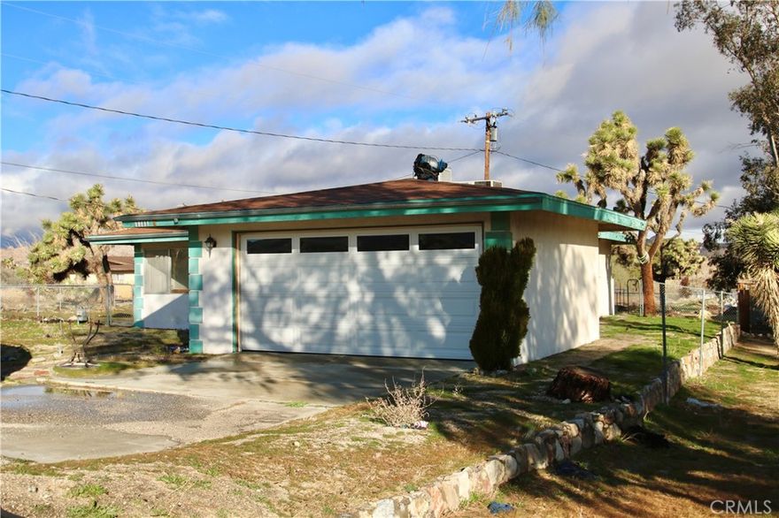 Discover the charm of Yucca Valley with this cozy fixer-upper! Embrace the vibrant local scene with nearby shops, restaurants, and outdoor adventures. Explore scenic hiking trails and immerse yourself in Southern California's natural beauty. This 2-bedroom, 1.5-bath home offers 1051 square feet of living space, an attached garage, and endless possibilities for renovation. With a spacious 10,800 square foot lot, unleash your creativity and transform this property into your dream oasis. Ready to make it yours?