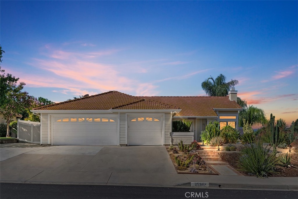 Welcome to 25382 Blackthorne Drive – a beautifully upgraded single-story home offering privacy, space, and modern comfort. Located on a quiet corner lot, this 3-bedroom, 2-bathroom home features 1,560 square feet of thoughtfully designed living space and a rare 3-car garage. Step inside to find stylish plank tile flooring throughout, new baseboards, and custom plantation shutters. The spacious living areas are filled with natural light thanks to new dual-pane windows throughout the home, while recessed lighting creates a warm and inviting atmosphere. The remodeled kitchen includes rich Thomasville cabinetry, granite counters, and plenty of storage—perfect for cooking and entertaining. The primary bath has been updated with a beautiful shower and glass enclosure, creating a clean and relaxing atmosphere. Each bedroom is generously sized, with ample closet space. Outside, enjoy the peaceful backyard complete with a private swim spa, ideal for winding down or getting in a low-impact workout. The fully fenced yard features durable and low-maintenance vinyl fencing, an Alumawood patio cover for year-round enjoyment, and plenty of room to relax or entertain. The fully fenced yard features durable and low-maintenance vinyl fencing, offering privacy and a secure space for pets or play. This home comes equipped with paid solar, a newer HVAC system, newer water heater, and energy-efficient upgrades throughout—helping you save money and live comfortably year-round. Located in a well-maintained and friendly neighborhood with no HOA and very low taxes, you’ll also love being close to top-rated schools, shopping, dining, parks, and easy freeway access for commuters. This is a move-in-ready gem that blends convenience, style, and value. Don’t miss your chance to own this incredible home!