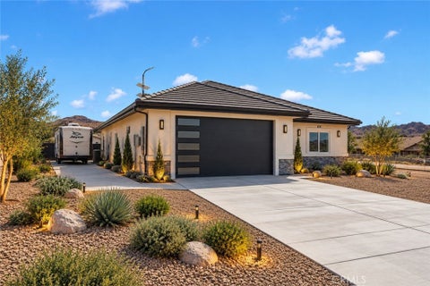 Photo of 24911 VIA VISTA RD, Apple Valley, CA 92308 (MLS # HD26199213)