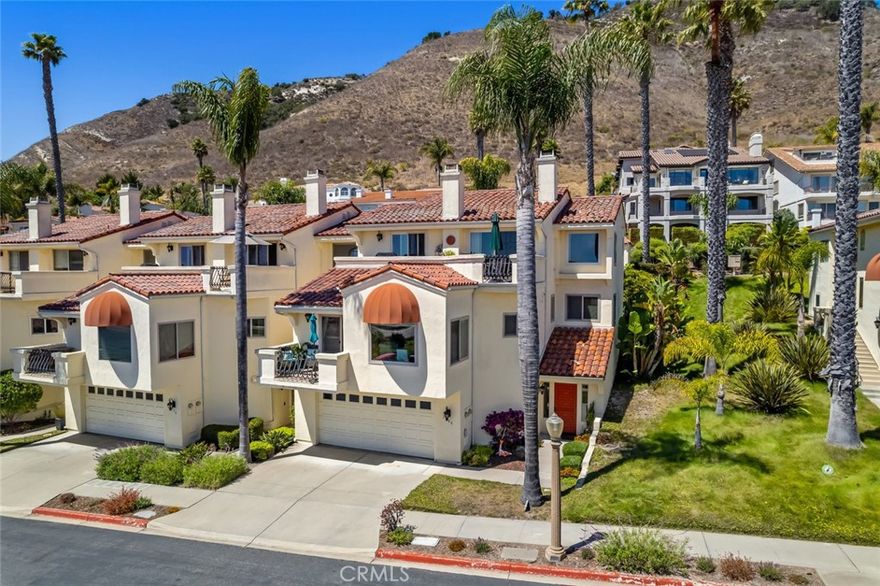 Ready for immediate move-in! Beautifully upgraded and remodeled, this ocean-view condo is located in the highly desirable gated community of Villa Antigua in Spyglass Ridge. An end-unit positioned near the front of the neighborhood, offers sweeping ocean and sunset views from nearly every room. With extra guest parking just outside, this residence delivers a blend of privacy, style, and coastal charm.

The main level reveals a bright, open interior where natural light and Pacific vistas take center stage. The living room opens to a private deck, creating a seamless indoor-outdoor flow—ideal for evening cocktails or quiet mornings. The dining area is wrapped in windows, capturing the ever-changing coastal light.

A thoughtfully designed kitchen features granite countertops, creative tile backsplash, recessed lighting, and stainless steel appliances, including a range, microwave/hood, refrigerator, and dishwasher—all framed by cherry cabinetry and sleek finishes.

A bonus elevated loft space offers the perfect escape after beach days or hosting friends. The primary suite, is a true retreat. Corner window views, dual-sink vanity, walk-in tiled shower and custom closet organizer. A second bedroom and full bath complete the upper level.

This home features a two-car attached garage, generous storage, and a location just minutes from local shopping, dining, renowned wineries, and award-winning beaches. HOA fees cover insurance, exterior building maintenance and landscaping. This is your opportunity to own a stunning high-style residence designed for those who value architecture, setting, natural light and ocean views.