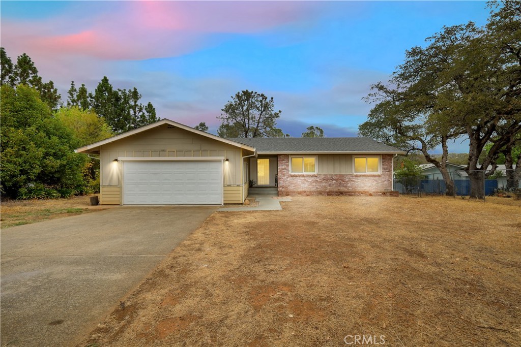 Discover the perfect blend of comfort, style, and convenience in this beautifully updated and truly move-in ready 3-bedroom, 2-bathroom home located in one of East Oroville’s most desirable neighborhoods. From the moment you arrive, you’ll appreciate the welcoming curb appeal, the mature trees that add shade and character, and the peaceful residential setting just minutes from everything Oroville has to offer. Step inside and be greeted by a light-filled, spacious interior that showcases fresh new paint throughout, brand-new flooring underfoot, and large dual-pane windows that capture the sunshine while providing energy efficiency and quiet comfort. The heart of the home is a generously sized living room that flows seamlessly into the dining area and a bright, functional kitchen, creating an ideal layout for both everyday living and entertaining.
Both bathrooms have been completely remodeled with modern fixtures, tasteful tilework, and elegant finishes, giving you a spa-like retreat right at home. Each of the three bedrooms is thoughtfully designed with ample closet space and natural light, while the primary suite offers a private sanctuary with its own stylish bath. Additional updates include a newer AC system to keep you cool during Oroville’s warm summers, energy-efficient windows for year-round comfort, and a freshly painted interior that provides a crisp, contemporary backdrop ready for your personal touch.
Outside, the attached two-car garage adds convenience and storage, and the property’s low-maintenance yard offers plenty of space for gardening, play, or simply relaxing in the pleasant foothill climate. The location is exceptional—just a short drive to the sparkling waters and outdoor adventures of Lake Oroville, where boating, fishing, hiking, and camping are all at your fingertips. Everyday errands are easy with nearby shopping centers, grocery stores, and a variety of dining options, while Oroville Hospital and local medical offices provide peace of mind and quick access to healthcare services.
Whether you’re a first-time buyer, a growing family, or simply seeking a turnkey home in a friendly community, this residence checks every box: updated, spacious, efficient, and close to recreation and conveniences. Don’t miss the opportunity to make this East Oroville gem your own and start enjoying the lifestyle you’ve been dreaming of today.