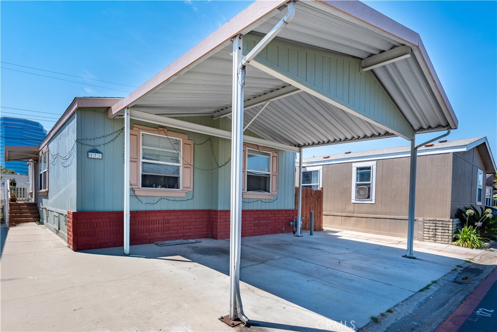 Welcome to 2300 S. Lewis St Space 172, Anaheim CA 92802. This Home features 3 bedrooms and 2 bathrooms with living space of 1176sqft. Great size carport that can fit 2 cars and nice side patio for family hangouts. The Ponderosa offers a club house, pool, gym, library and doggy runner. Centrally located near the freeways, Outlets of Orange, Disneyland, Stadiums, Parks, Schools, and Hospitals. This home needs a little TLC but it is priced to SELL!