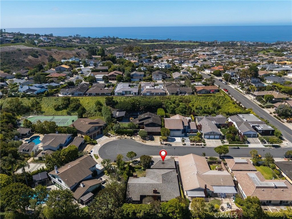 Photo of 3620 Catamaran Dr, Corona Del Mar, CA 92625 (MLS # OC26036410)