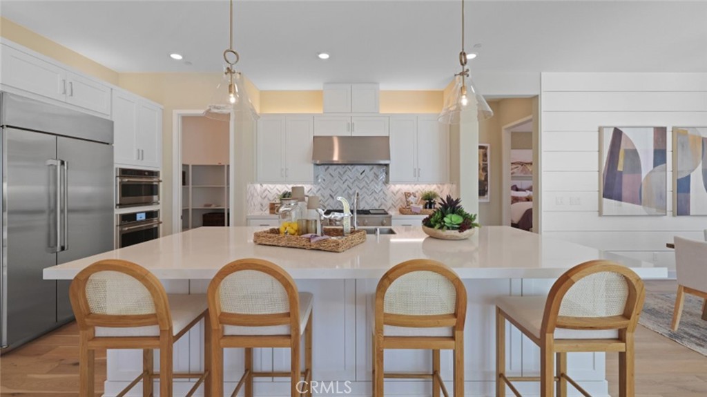 Set within a 55+ community, this single-level home features a spacious open floorplan shared between the family room, kitchen and dining room at the heart of the layout. Through stackable sliding glass doors is the California Room for outdoor moments. The luxe owner’s suite is situated at the back of the home, while a secondary bedroom can be found off the entry. An office is great for working from home.