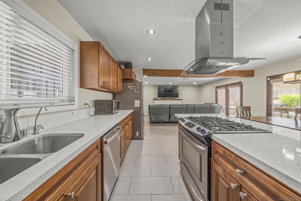 Charming 3-Bedroom, 2-Bathroom Single-Level Home in Lemon Grove – $699,999- SOLAR PAID OFF !!!! Nestled in the heart of Lemon Grove, this beautifully updated single-story residence offers the perfect blend of modern comfort and eco-friendly living. Priced at $699,999, this 3-bedroom, 2-bathroom home is ideal for those seeking a move-in-ready sanctuary with thoughtful upgrades throughout. Key Features: Spacious Layout: Enjoy 1,282 sq. ft. of well-designed living space, featuring an open-concept floor plan that seamlessly connects the living, dining, and kitchen areas. Energy Efficiency: Benefit from a fully paid-off solar system, ensuring low energy costs and a reduced carbon footprint. Modern Kitchen: The open-concept kitchen is equipped with contemporary appliances and ample counter space, perfect for both everyday meals and entertaining guests. Outdoor Living: Step outside to a newly paved driveway and a backyard featuring low-maintenance turf, ideal for relaxation and outdoor activities. Prime Location: Situated in a desirable neighborhood, this home offers easy access to local amenities, schools, and parks. This property combines style, functionality, and sustainability, making it a must-see. Don't miss the opportunity to make this house your home!