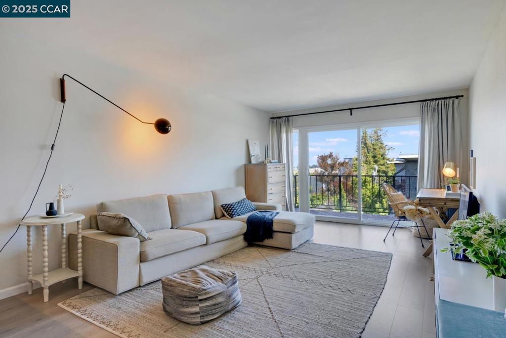 Perfect for Seniors, First-Time Buyers & Remote Work! Listed at an amazing price and offered as a short sale (all offers subject to lender approval). This updated home features a modern kitchen with stainless steel appliances, quartz counters, new cabinetry, open shelving, and an adjacent dining area that flows into the main living space. Enjoy serene SF skyline views from your private rear-facing balcony. Flexible layout includes a bonus space off the bedroom—ideal for office, nursery, or workout room. Updated bath with tile flooring and new vanity, double-pane windows, newer flooring, light fixtures, and double-door closets for ample storage. No shared walls with neighbors for extra peace and quiet. Prime location near Piedmont Avenue shops, restaurants, Whole Foods, Rose Garden, and Lake Merritt. Shared laundry and storage on the same level plus designated garage parking.