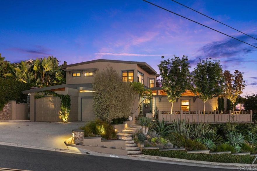 Remarkable Olde Carlsbad Ocean View Home  Perched in the historic and highly sought-after community of Olde Carlsbad, this mid-century Craftsman-inspired home is as special as it is rare. Ocean views greet you from multiple vantage points, creating the perfect backdrop for an entertainer’s dream, both inside and out.   Inside, thoughtful updates blend seamlessly with timeless character: Milgard doors and windows, wide-beamed ceilings, and a double-sided fireplace anchor the main living spaces. Custom cherry wood flooring and cabinetry, plush Berber carpet, and strategic designer lighting enhance the home’s warmth and sophistication. The chef’s kitchen, complete with a generous island and direct access to the yard and built-in BBQ, is ideal for small and large gatherings.  The primary suite offers true retreat living, with sit-down ocean views, a private balcony, large walk-in closet, separate water closet, and a luxurious soaking tub. Additional highlights include a downstairs den—perfect for movie nights or a potential fourth bedroom—and a versatile loft space at the top of the stairs.  Two bedrooms and 2 1/4 bath downstairs, primary upstairs, and en suite bathroom for each bedroom!  Step outside to a backyard oasis featuring a large covered sitting and entertaining area with views to the Pacific, a tranquil water feature, custom fencing, along with ample yard and lawn for kids and pets. Whether hosting friends or enjoying quiet evenings, this outdoor haven is made for relaxation and fun. Walk to area schools, shops, restaurants, easy access to nearby fwys and public transportation. NO HOA