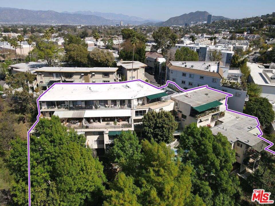 11975 Laurelwood presents the unique opportunity to acquire a quintessential value-add property in one of the strongest rental locations in Los Angeles. Perched at the top of a hill with panoramic views of the entire San Fernando Valley, each unit has a terrific floor plan and offers an abundance of natural light. The property boasts an ideal unit mix for the area, consisting of all large three-bedroom three bath, two-bedroom two bath, two-bedroom one bath, and some one-bedroom one bath units. Other property features include a large pool and a pool room that can be converted to an ADU (Buyer to Verify), a well-landscaped facade, a charming sitting area, an on-site laundry room, and ample on-site parking, which is exempt from soft-story retrofit (Buyer to verify). Close to some of the entire Valley's best dining, retail, and nightlife, this rare offering presents an astute investor with the unique opportunity to capitalize on higher market rents and acquire a premier turnkey asset in one of the best rental locations of Studio City.