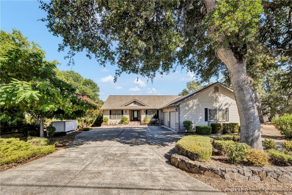 Private and Secluded with Lake Views! Tucked away in a peaceful setting, this well-maintained custom home offers both privacy and comfort. With 2,100 sq.ft. of thoughtfully designed living space, you'll find plenty of room for family, guests, and entertaining. Inside, the home features 3 bedrooms plus an office and a versatile bonus room that could serve as a 4th bedroom. The spacious master suite enjoys beautiful lake views, while a formal entry welcomes you into the open living areas with a gas fireplace for cozy winter nights. A breakfast nook area and dining room offer great views. Wood flooring flows throughout the main living spaces, with tile in both bathrooms and carpeting in the bedrooms.
Upgrades include crown molding throughout, a central vacuum system, and a whole-house generator, offering convenience and peach of mind. The home is entirely all-level inside. Below house outside is a large bonus area for abundant storage or for family entertaining.
With its move-in ready condition, serene location, and stunning lake views, this property is the perfect blend of style, comfort, and functionality.