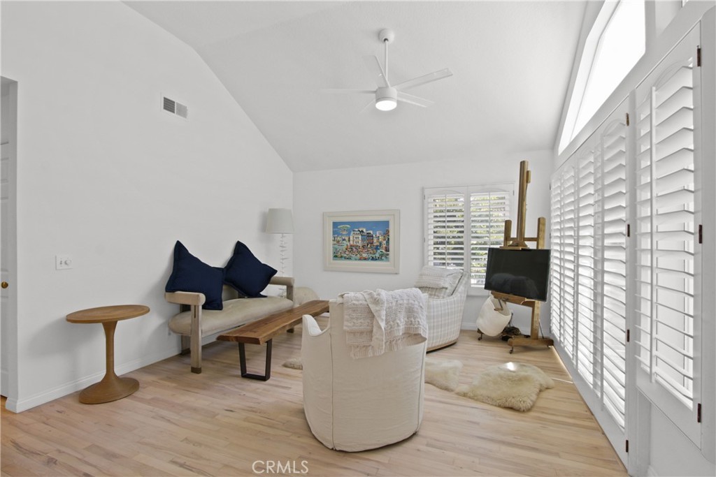 Experience elevated coastal living in this beautifully designed two bedroom, one bathroom upper-level condo in Newport Beach’s gated Bayridge community. Thoughtfully updated with reclaimed white oak flooring, crisp white walls, and an abundance of natural light, this home blends warmth and sophistication. The vaulted-ceiling living area flows seamlessly to a private outdoor terrace—perfect for entertaining or enjoying the ocean breeze. The kitchen features stainless-steel appliances, white cabinetry, and recessed lighting for a clean, modern feel. The primary suite is generously sized, offering comfort, privacy, and room to unwind. Additional highlights include in-unit laundry, an attached one-car garage, and no neighbors above or below. Residents enjoy resort-style amenities including a pool, spa, and gated entry. Moments from CDM beaches, Fashion Island, and the scenic Back Bay, this home is the perfect blend of luxury, privacy, and location. The lease is currently being offered furnished, though furnishings are negotiable based on tenant preference.