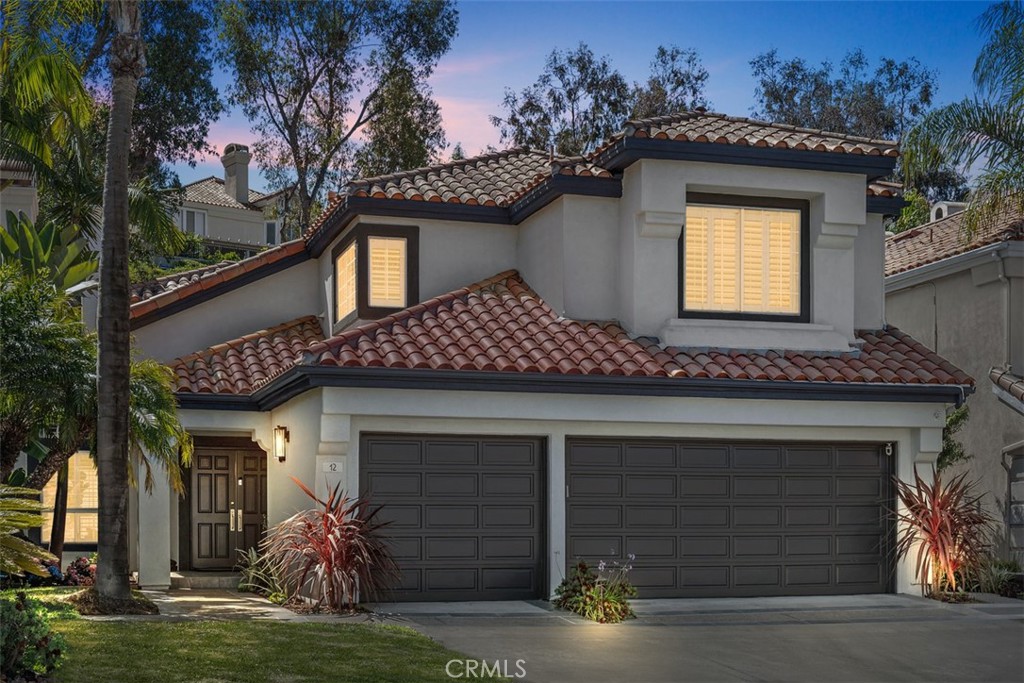 Welcome to this beautifully remodeled, model-perfect home located in the highly sought-after community of Marina Hills. Boasting 5 spacious bedrooms—including one conveniently located on the main level—plus a versatile bonus room, this residence offers both comfort and flexibility for modern living. Step inside to find a fully customized interior featuring wide-plank engineered oak flooring throughout, designer lighting, and a completely reimagined kitchen equipped with high-end appliances and contemporary finishes. The bathrooms and laundry room have been tastefully remodeled to reflect today's luxury standards, and a striking custom staircase serves as a true architectural centerpiece. Enjoy Southern California’s year-round sunshine in the entertainer’s backyard, which offers ultimate privacy along with upgraded hardscaping, a decorative stone wall with built-in fire pit, a premium stainless steel BBQ station, and low-maintenance landscaping. Additional upgrades include a full repipe completed in 2021, new water heater, seller-owned solar system, and an epoxy-coated garage floor. Ideally situated on a quiet, coveted cul-de-sac street with low HOA dues, this home truly has it all—location, luxury, and lifestyle. Located in top-rated school district. Marina Hills residents enjoy access to the following amenities: a Jr. Olympic pool, spa, tennis courts, beautiful clubhouse, parks, playground, and access to the Salt Creek Trail. Don’t miss your opportunity to own this exceptional home in one of the area's most desirable neighborhoods!