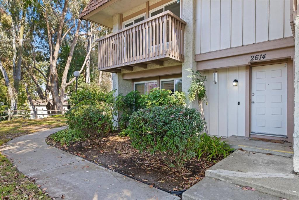 Shaded by mature trees, this updated end unit townhome captures the calm of a park-like setting with the convenience of coastal Carlsbad. Fresh paint, luxury vinyl plank flooring throughout, and updated cabinets and fixtures in the kitchen and baths give the home a modern, move-in ready feel. Enjoys a serene, elevated location away from street activity, this home offers quiet surroundings, natural shade on warm summer days, and gentle afternoon breezes. The floor plan includes three bedrooms, two and a half baths, and a private patio connecting the home to the two-car garage—an ideal space for outdoor dining or entertaining. Community amenities include two clubhouses, swimming pools and spas, tennis courts, playgrounds, and walking trails. All within minutes of shopping, restaurants, Carlsbad Village, freeways, and the beach. Shaded by mature trees, this updated end unit townhome captures the calm of a park-like setting with the convenience of coastal Carlsbad. Fresh paint, luxury vinyl plank flooring throughout, and updated cabinets and fixtures in the kitchen and baths give the home a modern, move-in ready feel. Enjoys a serene, elevated location away from street activity, this home offers quiet surroundings, natural shade on warm summer days, and gentle afternoon breezes. The floor plan includes three bedrooms, two and a half baths, and a private patio connecting the home to the two-car garage—an ideal space for outdoor dining or entertaining. Community amenities include two clubhouses, swimming pools and spas, tennis courts, playgrounds, and walking trails. All within minutes of shopping, restaurants, Carlsbad Village, freeways, and the beach.