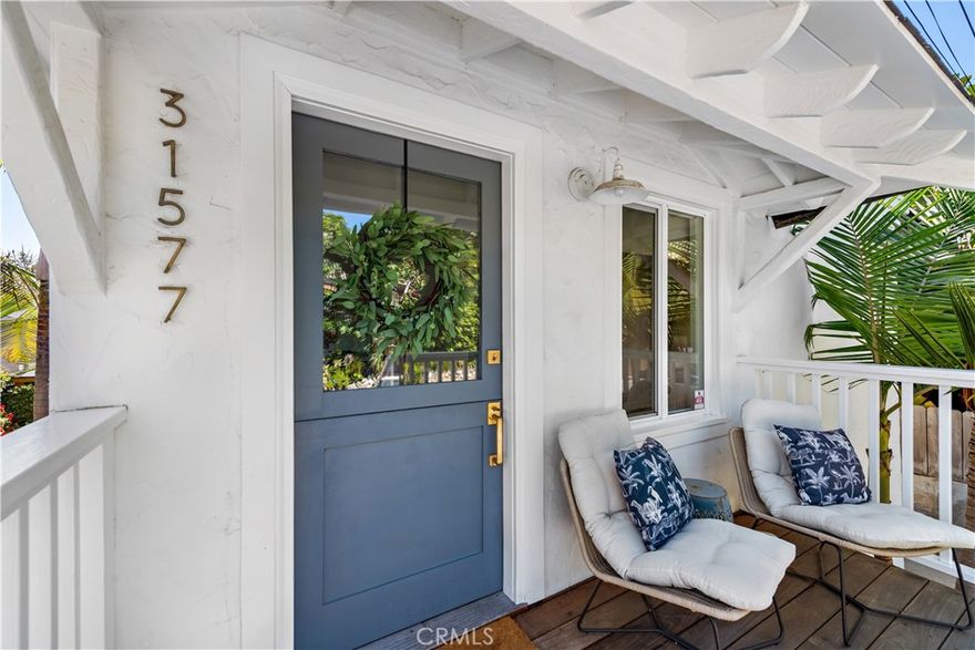 Welcome to your idyllic coastal escape in South Laguna a home that effortlessly blends beachside charm with modern luxury, just moments from the shoreline. Bathed in natural light, this beautifully curated residence features warm oak hardwood floors, crisp white cabinetry, and gleaming white quartz countertops that evoke a fresh, airy ambiance throughout. The chef's kitchen is a standout, boasting high-end Fisher & Paykel appliances, including a gas stove and double-drawer dishwasher, designed for both everyday convenience and stylish entertaining. Start your mornings in the cozy dining nook and wind down with breathtaking ocean views from the inviting outdoor sitting area. The main floor offers a peaceful primary bedroom complete with built-in closets and drawers, and a thoughtfully updated bathroom featuring a walk-in shower with timeless subway tile and a modern vanity. Vaulted, beamed ceilings add character and a true sense of coastal retreat. Downstairs, a spacious flex space serves beautifully as a second bedroom or relaxed living space, complemented by a full bath with a deep soaking tub perfect for a spa-like experience at home. You'll also find a full-size laundry closet, generous storage, a coat closet, and a dedicated office with custom built-ins for seamless work-from-home days. With 2 3 parking spots, abundant storage beneath the home, and a location that puts beaches, trails, cafes, and boutiques within easy reach, this South Laguna gem offers the perfect balance of comfort, functionality, and timeless seaside appeal.