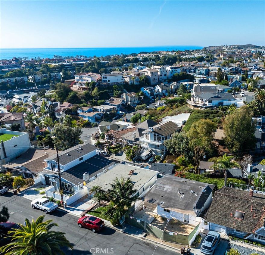 Create Your Dream Coastal Home with Panoramic Ocean Views in Dana Point.  

 Discover a rare opportunity to own a premier ocean-view homesite in one of Dana Point’s most coveted hillside neighborhoods. This unique property includes pre-approved plans for a striking 2,000 sq. ft. contemporary residence featuring 3 bedrooms and 2.5 baths—designed with both style and the coastal lifestyle in mind.

The plans for the new home will have a modern layout that emphasizes indoor-outdoor living, with two expansive rear decks and a spacious rooftop deck perfectly positioned to capture dramatic sunsets, sweeping ocean vistas, and refreshing sea breezes. Whether you envision a full-time residence or a weekend getaway, this property will offer the perfect canvas for your coastal dream.

Highlights Include:

• Exceptional Setting – Located in one of Dana Point’s most desirable hillside communities.

• Spectacular Views – Panoramic ocean outlooks from multiple outdoor living spaces.

• Ready-to-Build Plans – Pre-approved for a sleek, modern home with high-end finishes.

• Prime Convenience – Minutes to Dana Point Harbor, The ROW, beaches, dining, and shopping.

• No HOA – No homeowner association restrictions or fees.

• Limitless Potential – A rare chance to design a luxury home in a neighborhood known for upscale coastal living.

Whether you choose to move forward with the approved new-build plans or renovate the existing home, necessary foundation repairs will need to be addressed first. A detailed estimate from a trusted Dana Point foundation specialist is available—contact us for more information.

Opportunities like this are few and far between—secure your slice of paradise today!