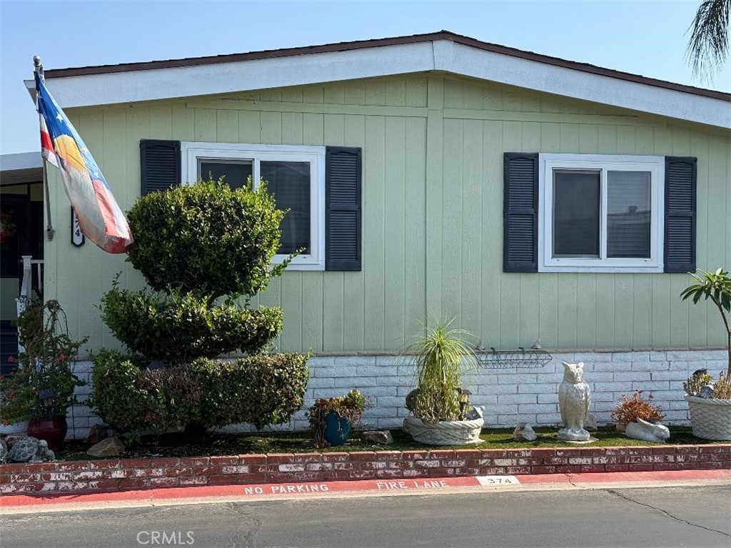Welcome to the beautiful Rancho Ontario Mobile Home Park, 55+ This home has many features, with many upgrades. Remodel: kitchen, shed, awning, flushing, floors, Also crown molding, new windows, inserts copper for refrigerator, artificial grass, gutters, bathroom texture. This home has it all!!! Large laundry. New back porch