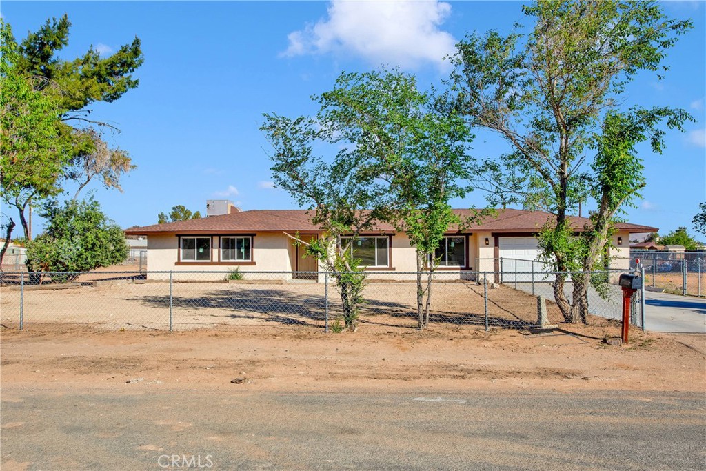 Discover the perfect blend of space, comfort, and opportunity. This 4-bedroom, 2-bathroom home offers nearly 2,000 sq ft of living space on a full 1-acre, horse-zoned lot with gorgeous mountain views. This freshly remodeled home has a ton of new things ready for the next homeowner. NEW roof, NEW septic system, NEW windows, FULL remodel of the inside and MORE. Enjoy a spacious living room with a cozy fireplace, a functional kitchen with breakfast bar, and gated parking for all your cars, RV, or boat. The fully fenced property provides endless possibilities—build a workshop, add a pool, or create your dream outdoor retreat. This home is ideal for those seeking privacy, versatility, and High Desert charm.