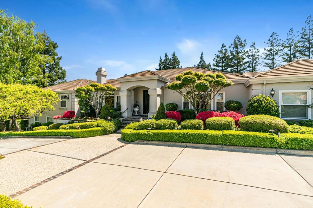 The most beautiful estate in BEAUCHAMPS- Parker Range neighborhood. Five large Bedrooms including 2 master suites. 4.5 Baths in Main house. Magnificent Living room with Coved ceiling and a custom mantel gas Fireplace. Specious formal Dining room.Separate Family room features: boxed beam ceiling, built in Alderwood Cabinetry, Wet Bar: granite counter, wine Fridge. Informal Dining area. Gourmet Kitchen: custom cabinetry & granite counter & center island. Stainless Steel Appliances: Thermador refrigerator/freezer, 6 burner gas range, 2nd oven, warmer, Microwave oven, trash compactor. Pantry. Master suite features: sitting area, Master bath w/ stall shower, jetted tub, porcelain floor, marble counter. Large walk-in closet. 3 custom Fireplaces in Living, Family, & bedroom. interior & exterior Surround Sound/Bose speakers. long circular driveway. Manicured landscaping. Formal entry. large balcony. large windows. Skylights, natural lights. Inside laundry. Pool/SPA, Cabana w/Kitchenette, 1/2 Bath & outdoor heated shower. Fully fenced yard: mature trees & thriving fruit trees. irrigation system. Multi outdoor sitting. 3 garage w/built-in cabinets. Top rank schools: BLUE HILLS*KENNEDY*MONTA VISTA* next to BEAUCHAMPS Park:playground, Basketball, Tennis Ct. Close to De Anza College, 85 & 280