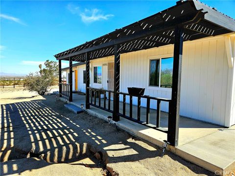 Photo of 70995 Indian Trail, 29 Palms, CA 92277 (MLS # JT26073101)