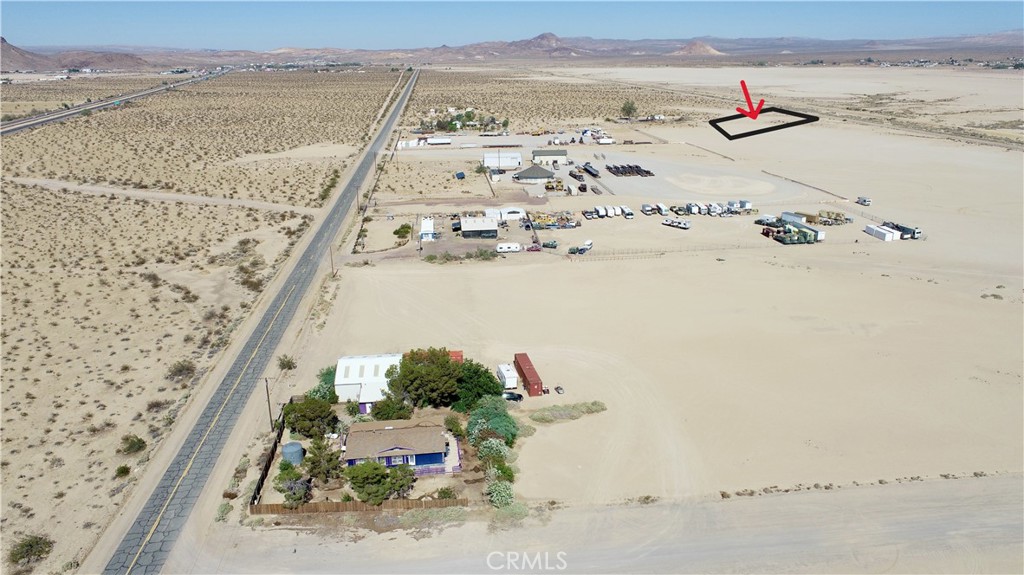 Discover the perfect blend of location and potential with this flat, build-ready lot in Yermo. Just 10 minutes from the historic Calico Ghost Town, 4 minutes from Eddie’s World, and a short 40-minute drive to Victorville—this parcel offers privacy without sacrificing convenience. For those looking toward expansion, the same owner also has a single-family home just three lots over, making this an excellent opportunity to extend your footprint. Whether you're looking to build, invest, or simply hold land near key destinations—including a 2-hour drive to Las Vegas—this is a prime piece of the High Desert.
