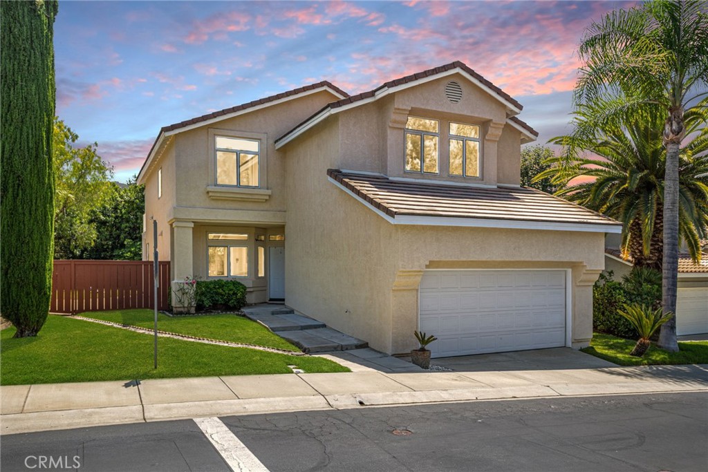 Welcome to Circle R one of North Escondido’s best-kept secrets! This spacious 4-bedroom, 2.5-bath home offers incredible value and room to grow, all in a community surrounded by rolling hills, golf course views, and resort-style amenities. Downstairs features a traditional layout with two separate living spaces, a dining area, and a cozy fireplace in the family room. The kitchen opens to the living space and offers plenty of cabinet storage, a gas range, and direct access to the backyard, perfect for entertaining or enjoying quiet evenings at home. All four bedrooms are located upstairs, including a spacious primary suite with dual closets, a private bathroom, and its own balcony overlooking the backyard, a peaceful place to enjoy your morning coffee or unwind at sunset. The secondary bedrooms are generously sized, offering flexibility for a home office, playroom, or guest space. Additional highlights include: Durable tile flooring throughout the downstairs, new interior paint and updated fixtures, low-maintenance backyard with large patio space .The Treasures at Castle Creek community offers access to a private pool, spa, tennis and pickleball courts, and is adjacent to Castle Creek Golf Course. This home also offers quick access to local favorites like Welk Resort, Deer Park Winery & Museum, Dixon Lake, the San Diego Safari Park, and Champagne Lakes RV Resort. Whether you're looking to upsize, invest, or simply enjoy life in a peaceful, amenity-rich neighborhood, this home checks all the boxes. Come see why so many people love calling Circle R home!