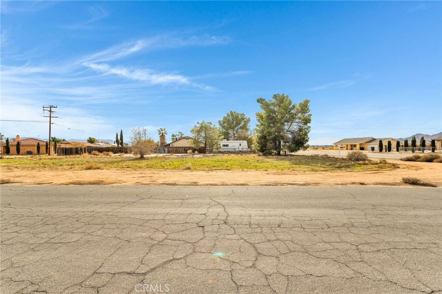 Vacant lot in Apple Valley with beautiful views of the desert! Corner lot, Rural feel, but only a few minutes away from major shopping centers and close freeway access. There was previously a home here, so buyer to verify all utility connections and process for rebuilding