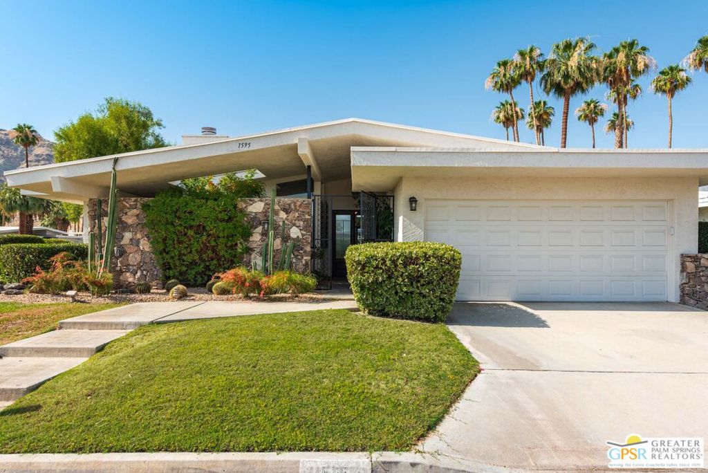 Welcome to 1595 E Canyon Estates. This stunningly remodeled 2 bed/2 bath condo is one of the free standing units in this development. No Common Walls. Walk into the bright, open and airy great room with direct access to a beautifully appointed patio complete with perfect mountain views. You'll enjoy the open kitchen with quartz counter tops, all KitchenAid Appliance Package and plenty of storage. Guestroom has a fireplace, and large walk in closet. Primary Bedroom is large with direct access to patio, and a well appointed and remodeled bathroom. Enjoy the 9 hole Par 3 golf course, Pickleball courts, Tennis Courts, 15 pools/12 spas and fitness center in the club house. The Community architect was Charles E. Du Bois built in the late 1960's with models first opened in 1970. HOA includes Wi-Fi, Cable, Monthly exterior Pest control, lighting and Landscaping. This beautiful community offers an excellent location close to all the Palm Springs area has to offer.
