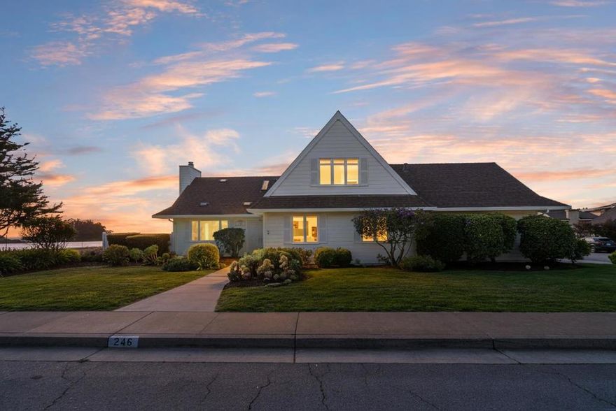 Coastal elegance in the heart of Seascape. Set on one of the most desirable lots in the community, this beautiful coastal residence offers privacy, scenic views, and effortless California living. Located at the end of a quiet cul de sac beside a one hundred acre organic farm, the home enjoys wide vistas of Monterey Bay and the surrounding countryside, creating a rare blend of serenity and natural beauty just moments from the beach. The light filled interior features vaulted ceilings, generous windows, and an easy flow between living, dining, and kitchen spaces. Warm wood flooring, a central fireplace, and soft neutral finishes enhance the inviting coastal character. The spacious ground floor primary suite provides a peaceful retreat with garden views and direct access to outdoor living areas. Upstairs, two bright bedrooms offer comfort and flexibility, including one with a private balcony ideal for enjoying ocean breezes and vibrant Seascape sunsets. The landscaped yard opens to broad greenbelt areas and farmland, giving a sense of openness seldom found so close to the coast. With nearby beaches, Seascape Resort, Seascape Golf Club, local cafes, and boutique shops, this is coastal living at its most relaxed and refined.