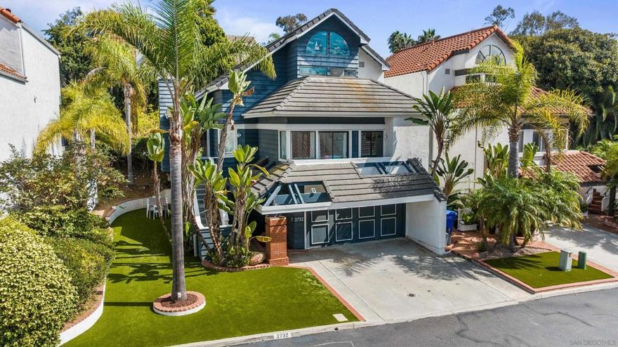 Beautifully updated 4 bedroom home under 2 miles from the beach and Carlsbad Village!  This move-in ready property features a large open floor plan and has been thoughtfully upgraded throughout featuring all new luxury plank flooring, fresh interior paint, new baseboards, modern light fixtures, and gorgeous landscaping with turf for easy maintenance.  The fully remodeled kitchen is a standout, equipped with stylish finishes and high-end Café appliances perfect for cooking and entertaining. The layout includes a downstairs bedroom with its own separate entrance, full bath, and kitchenette, offering excellent potential for an ADU setup, guest space, or rental opportunity.  Located less than 5 minutes to I-5 and just under 2 miles to the sand, surf, and all the restaurants and shops of Carlsbad Village, this location is unmatched!  The community offers fantastic amenities including a pool, spa, and tennis courts, making this the perfect place to enjoy the Southern California lifestyle.