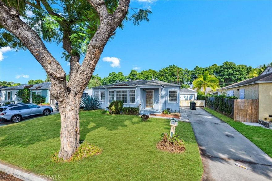 Bring your tool box—this home is full of potential! Several photographs have been digitally staged.
Charming 3-bedroom, 2-bath home on a beautiful pride-of-ownership street lined with a “kissing canopy” of trees. Offering 1,144 sq. ft. of living space on a generous 6,335 sq. ft. lot, this home retains its original character and is ready for your personal touch.
Features include original hardwood floors, inside laundry, central A/C, and a long driveway with ample parking leading to a detached 2-car garage. The third bedroom opens to an unpermitted enclosed sunroom (not included in square footage), providing extra space for relaxation or entertaining.
The expansive lot offers room to garden, expand, or create your dream outdoor retreat. Located in a highly sought-after neighborhood known for its tree-lined streets and top-rated schools—this is an incredible opportunity!