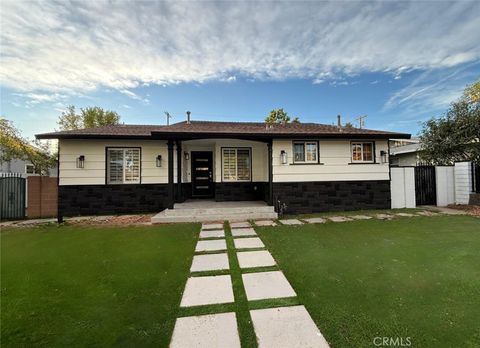Photo of 9123 Woodley Ave, North Hills, CA 91343 (MLS # SR25220511)