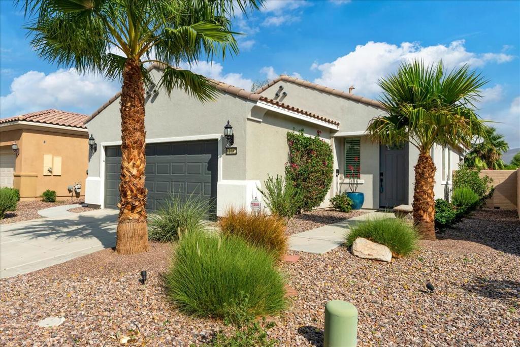 TURN-KEY FURNISHED GRANADA,IMMACULATE AND MOVE-IN READYWelcome to this beautifully maintained and decorated Granada Floorplan, offering 1099 sqft of thoughtfully designed living space and turnkey furnished for immediate enjoyment. From the moment you arrive, you will notice the custom front door and freshly painted exterior, setting the tone of the quality and care throughout the homeInside fresh interior paint, wood tile flooring and newer carpet in the bedrooms, elegant plantation shutters create a clean and welcoming atmosphere. Each room is equipped with ceiling fans for year round comfort. The open living space flows seamlessly into a kitchen and dining area ideal for entertaining or relaxed everyday living. The primary suite offers comfort and functionality, featuring dual vanities, a spacious walk-in closet and plenty of natural light. The second bedroom is perfect for guests or a home office. Step outside to your private backyard oasis with lush professional landscaping, an oversized patio an a walkway that wraps around to the front of the house. The garage includes ample storage and epoxy finished concrete making it very practical . This home has everything you need and more. Just bring your toothbrush and start living the lifestyle you deserve!