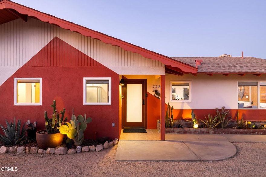 Welcome to 7284 Saddleback Rd, a rustic-modern bohemian oasis tucked away on a corner lot in Joshua Tree's coveted Friendly Hills neighborhood. Built in 1967 and thoughtfully reimagined, this 3-bedroom, 2-bath home--including a serene primary suite--blends midcentury character with modern comfort. Every bedroom opens to the outdoors: two onto private courtyards and one to the rear patio. The light-filled great room features reclaimed wood accents, high ceilings, and a striking rock fireplace, creating an inviting open space that connects the living room, chef's kitchen, and dining area--perfect for gathering and entertaining. Step outside to 1.25 acres of desert beauty with panoramic views, where a cowboy tub, hot tub, firepit, hammocks, swingset, and multiple lounging areas invite relaxation under the sun or stars. An attached two-car garage offers storage or potential, along with a charming detached cottage, currently used as a bunkhouse with its own deck and power. Just minutes from Crossroads Cafe, The Dez, the weekly farmer's market, and the Joshua Tree National Park entrance, this home captures the essence of desert living--offered fully furnished, with an EV charging outlet, ready for your next adventure.