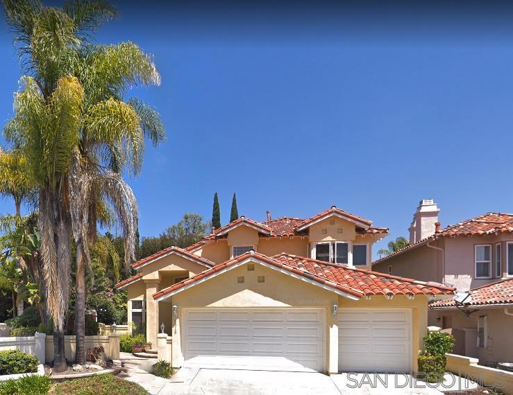 This beautiful home is nestled in a quiet cul de sac and features a welcoming front courtyard with a tranquil fountain and lush foliage. Spacious house with four bedrooms, den/office downstairs, three full bathrooms, separate living and dining room areas and kitchen that's open to a family room with cozy fireplace. The house is finished with a three-car garage, a laundry room with machines, large back patio and easy-care side yard.